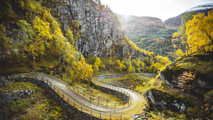 Winding mountain road in Norway during autumn