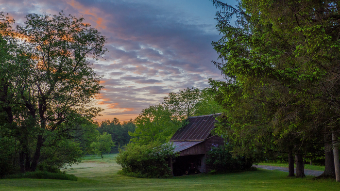Barn and trees at sunset in Connecticut, USA