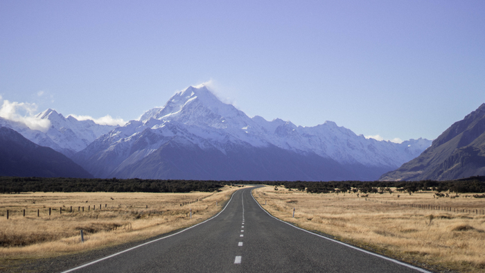 Road leading to snow-capped Mount Cook, New Zealand