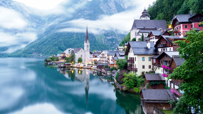 Hallstatt, Austria: Lakeside village with mountains and church