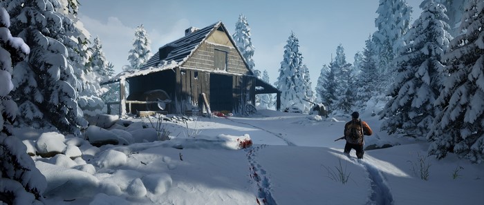 Man with rifle near snow-covered barn with blood tracks