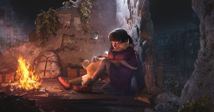 Girl hugging dog by campfire in abandoned city at night