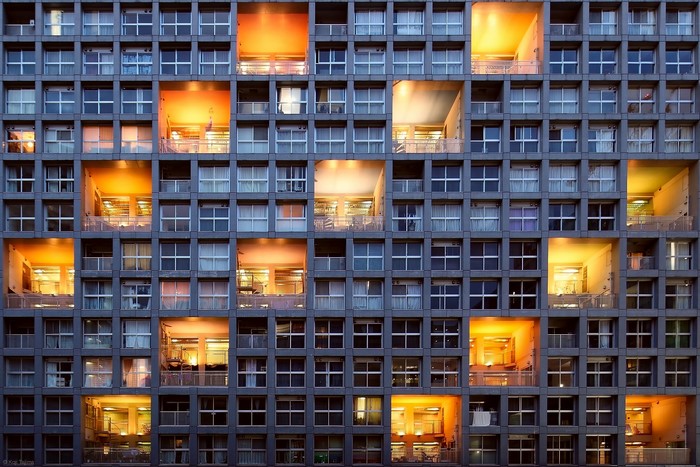 Building facade with illuminated windows