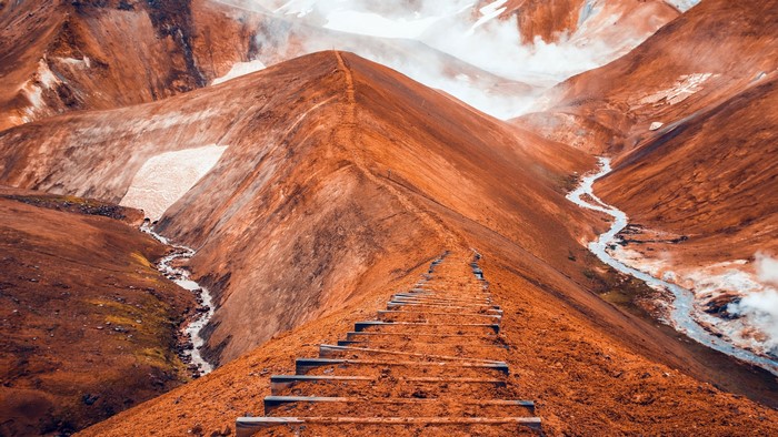 Wooden stairs leading up a mountain in Iceland