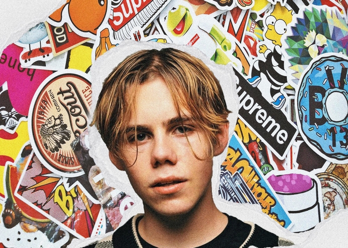 The Kid LAROI surrounded by stickers