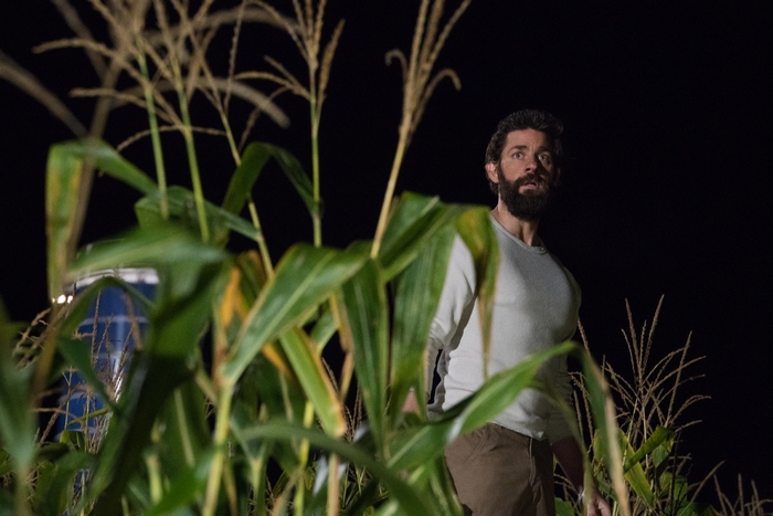 Lee Abbott in a cornfield at night