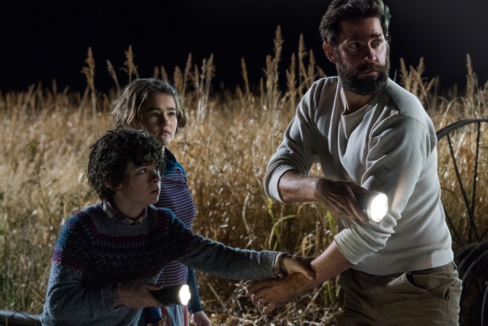 A Quiet Place: Regan, Marcus, and Lee Abbott with flashlights
