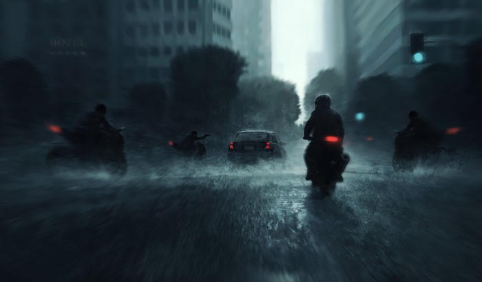 Motorcyclists and car in a flooded city street