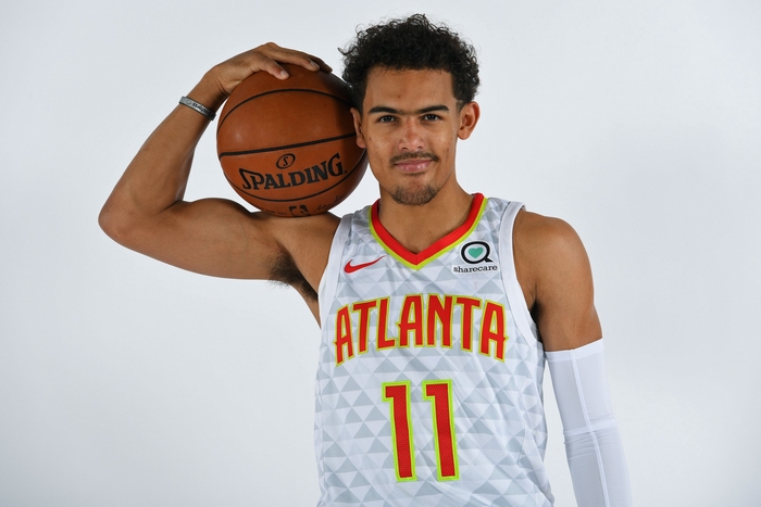 Trae Young of the Atlanta Hawks with a basketball