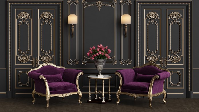 Ornate room with purple chairs and flower vase