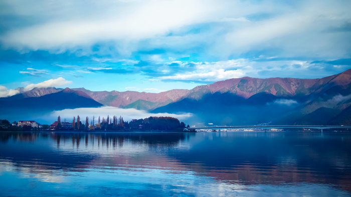 Lake with mountains and clouds in Japan