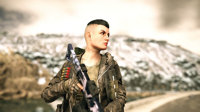 Woman with shotgun in snowy mountains