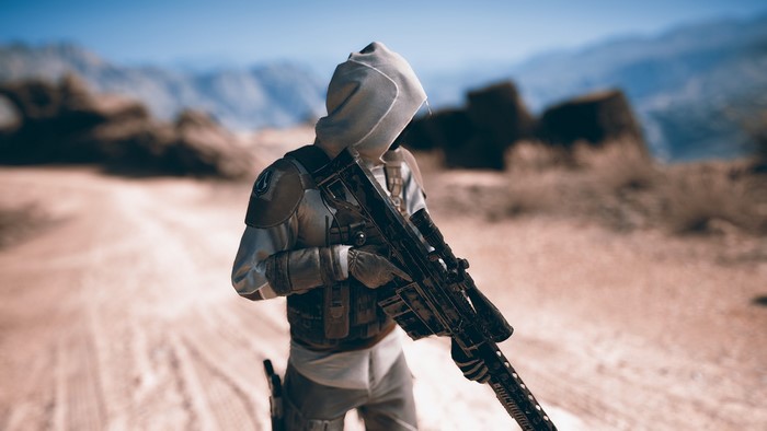 Ghost Recon Wildlands character with sniper rifle in desert