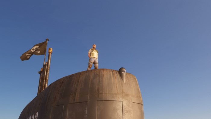 Man on a submarine with a pirate flag