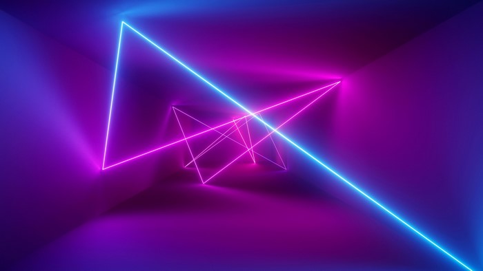 Neon light triangles in a dark room