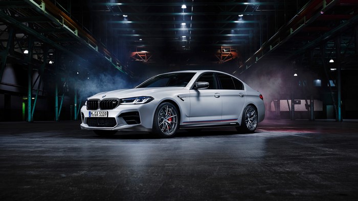 White BMW M5 Sedan in Industrial Warehouse