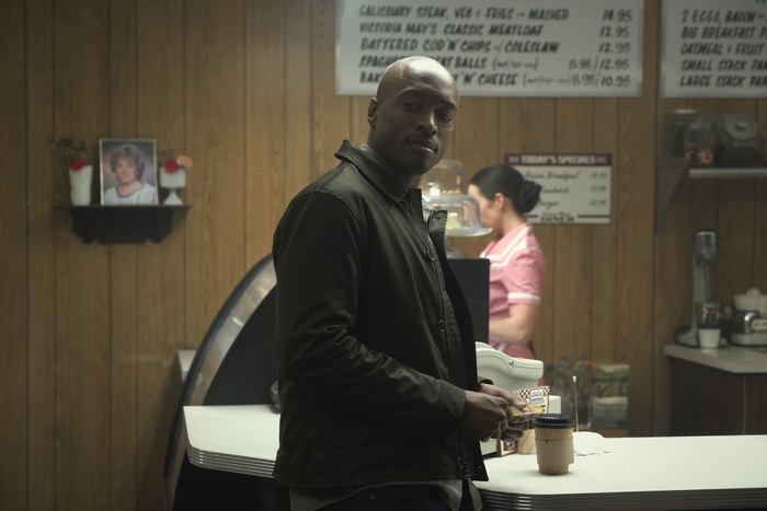 John Henry Irons in a Diner