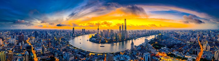 Shanghai skyline with Oriental Pearl TV Tower at sunset