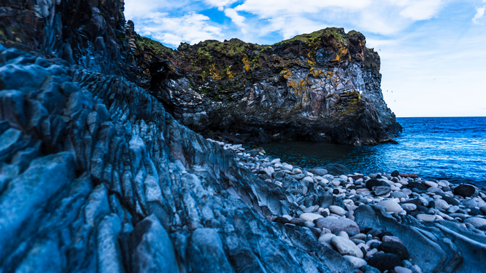 Rocky coastline with ocean and sky