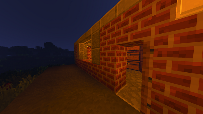 Minecraft building at night with chests