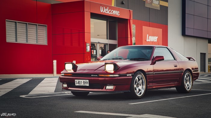 Red Toyota Supra MK3 with Pop-Up Headlights