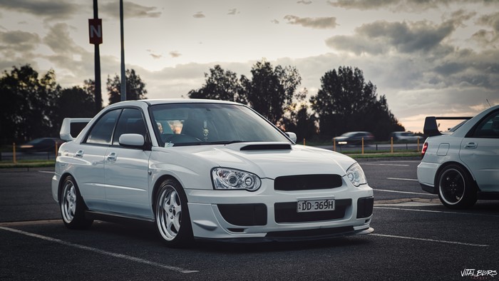 White Subaru Impreza WRX in a car park