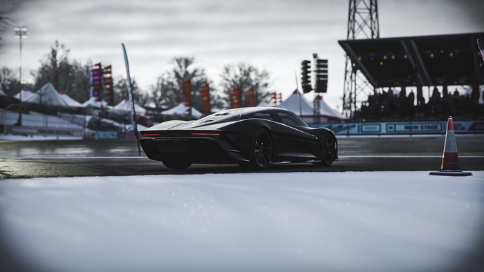 McLaren Speedtail on a wet track with a crowd in the background