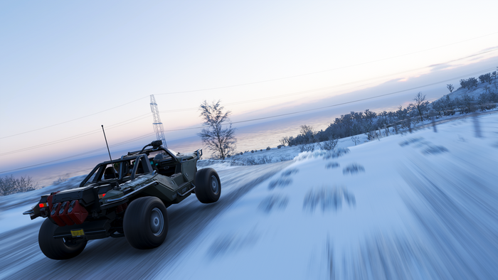 M12 Warthog driving on a snowy road in Forza Horizon 4