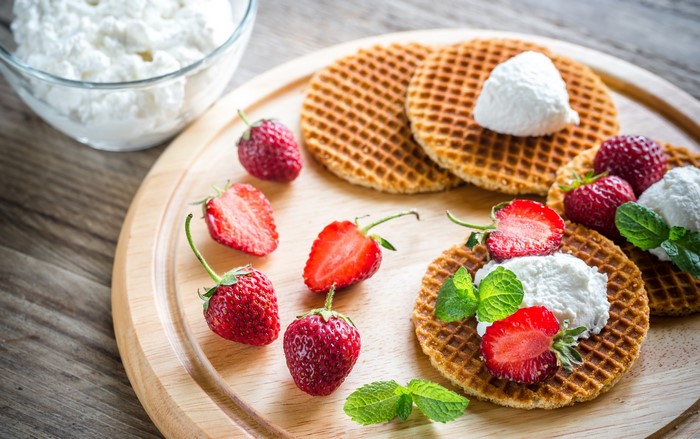Waffles with strawberries and cream