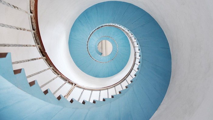Blue spiral staircase in Lyngvig Lighthouse, Denmark