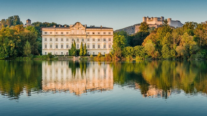 Schloss Leopoldskron and Fortress Hohensalzburg reflected in water