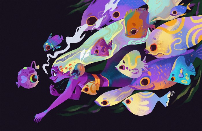 Mermaid with colorful fish in the sea