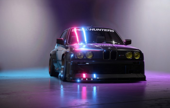 Black BMW M3 with Speedhunters sticker and neon lights