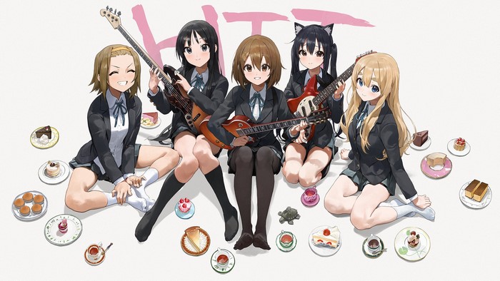 K-ON! girls enjoying tea time with sweets and instruments