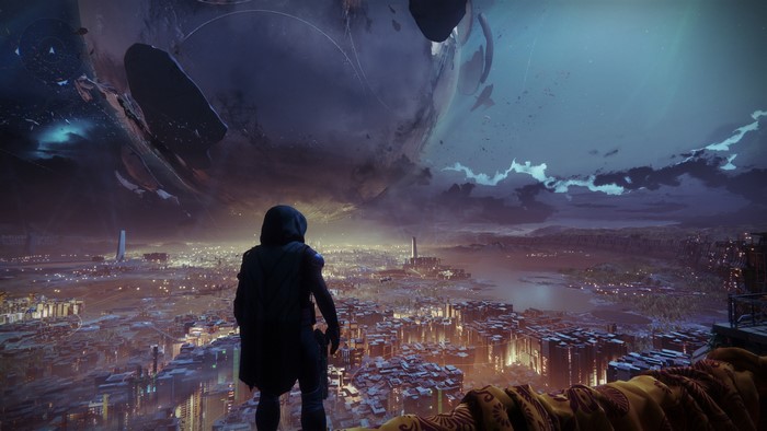 Destiny 2 Guardian overlooking a city at night