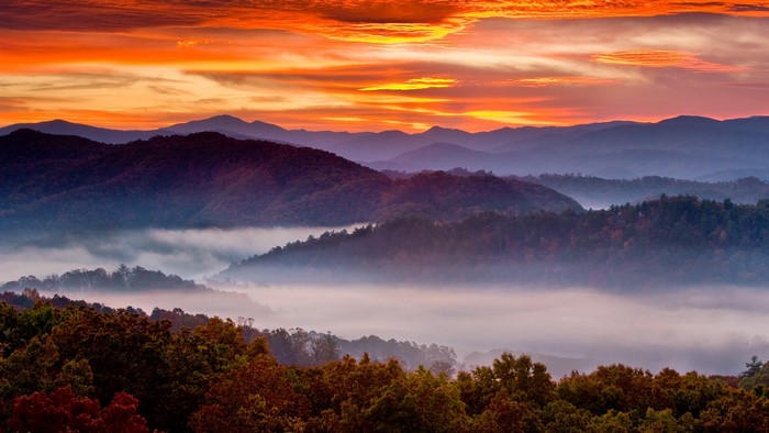 Sunrise over misty Smoky Mountains landscape