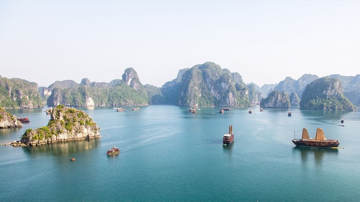 Halong Bay, Vietnam with traditional boats and limestone karsts