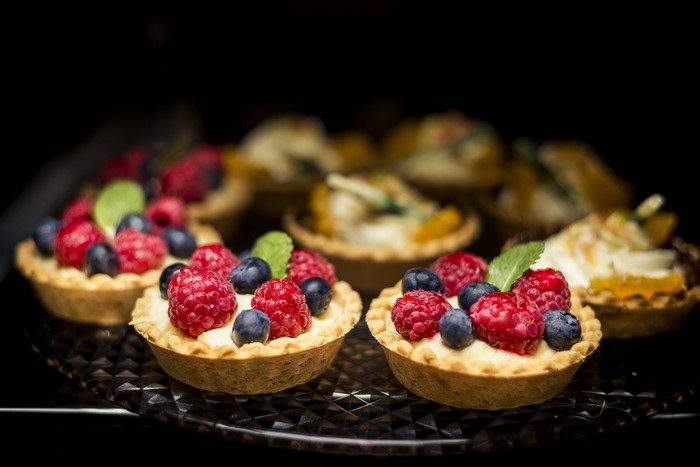 Fruit tarts with raspberries and blueberries