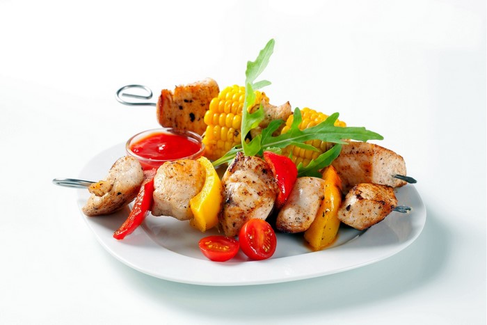 Chicken skewers with vegetables and dipping sauce