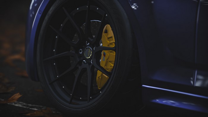 BMW M5 F90 wheel and yellow brake caliper