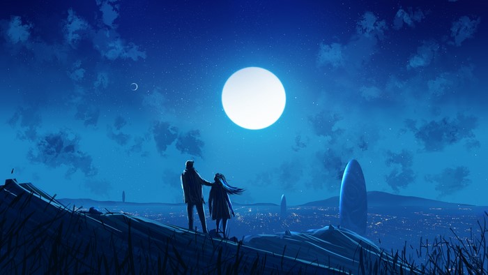 Couple under moonlight overlooking city