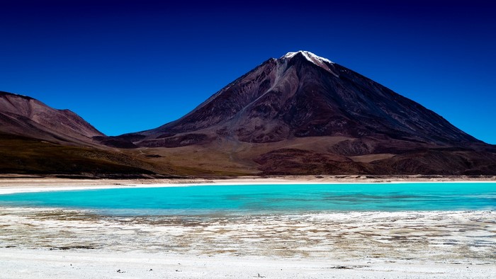 Licancabur volcano and turquoise lake in Bolivia