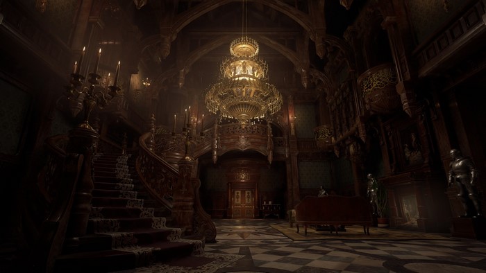 Interior of a grand hall with a chandelier and staircase