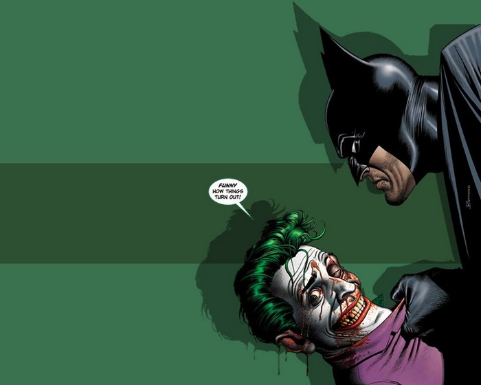Batman holding the Joker