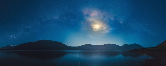 4K Milky Way over Mountains and Lake at Night
