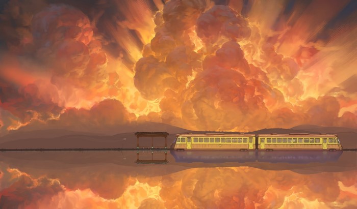 Train at a station with dramatic sky