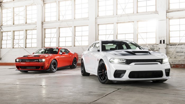 Red Dodge Challenger SRT and White Dodge Charger Hellcat in Hangar