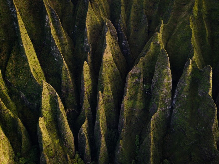 Aerial view of moss-covered mountains in Hawaii