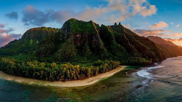 Green mountains and coastline at sunset, Hawaii