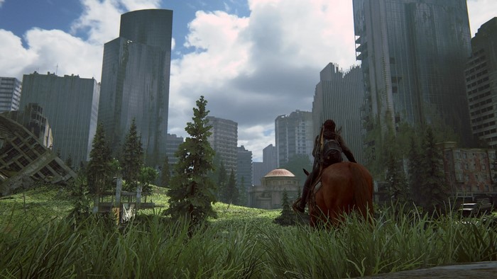 Ellie from The Last of Us on horseback in a ruined city